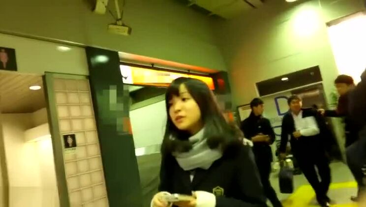 Snazzy asian female in public place