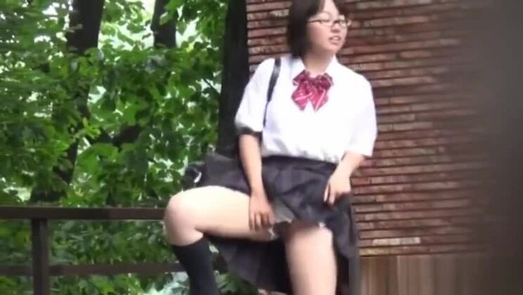 Winsome Japanese hussy in a kinky fetish XXX video in public